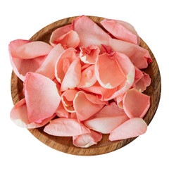Coral-rose-petals-on-wood-color-of-the-year-flower-holidays-concept-in-png