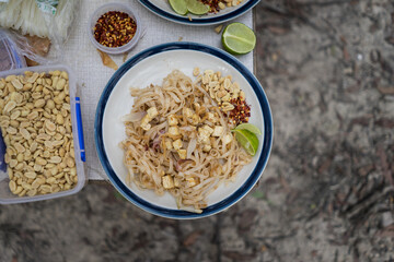 Pad Thai with chilli, peanuts and lime during a Camping Trip