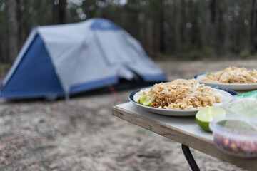 Pad Thai with chilli, peanuts and lime during a Camping Trip