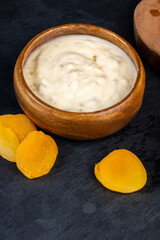 fresh yogurt made from milk with pieces of dried apricots