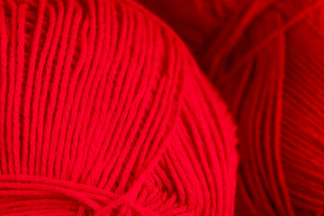 woolen threads of red color for knitting knitting close-up