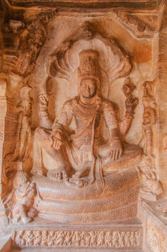 Vishnu sitting on Sheshnag, Badami cave temple, Badami, Karnataka, India.