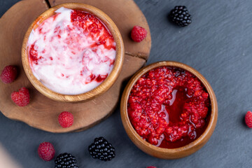 fresh yogurt with crushed juicy raspberries of red color