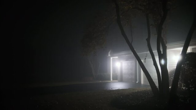 A lonely house in a misty mystical night