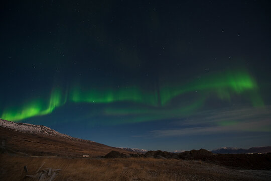 aurora borealis above the mountains © Keitaro