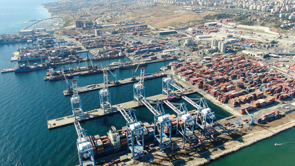Container ship docked in port as seen from above