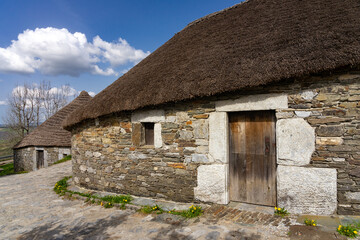 Traditional houses called pallozas with their thatched roofs in the beautiful village of O Cebreiro, which is a crossing point on the way of Santiago, Lugo.Spain