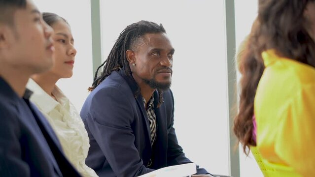 african american business man doubt in group of diversity and asian audience people in meeting  seminar at  conference hall