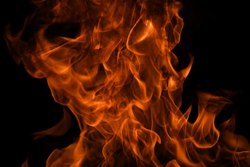 Flame fires. Burn lights on a black background. Fire flames on black background. Abstract fire...