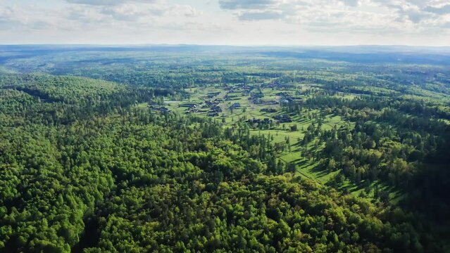 Southern Urals in the summer: Zilairsky district, Kizlar-Birgan Bashkir village. Aerial view.