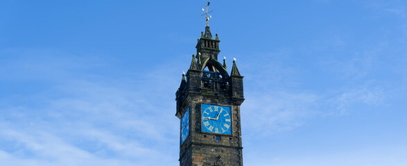 Fototapeta na wymiar Tolbooth Clock Steeple Tower in Merchant City area of Glasgow