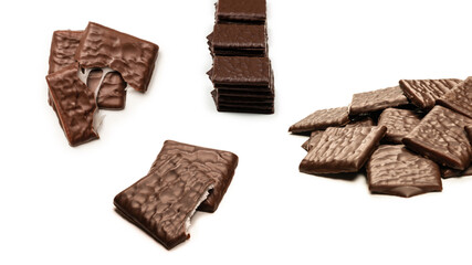 Dark chocolate candies isolated on white background.