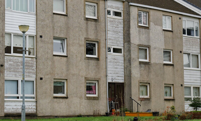 Fototapeta na wymiar Council flats in poor housing estate with many social welfare issues in Port Glasgow