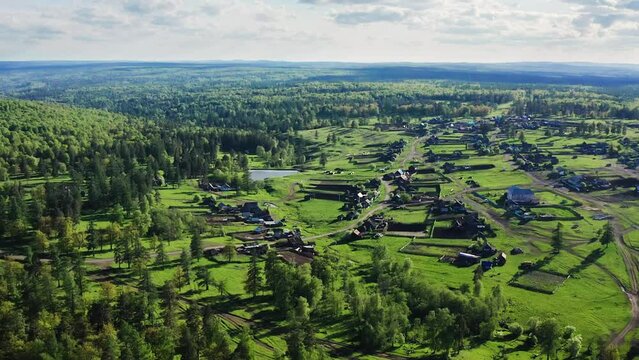 Southern Urals in the summer: Zilairsky district, Kizlar-Birgan Bashkir village. Aerial view.
