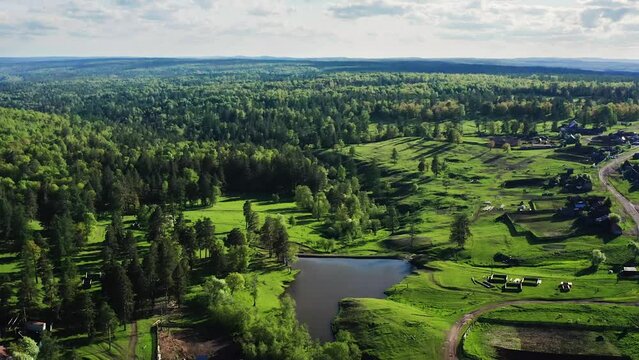 Southern Urals in the summer: Zilairsky district, Kizlar-Birgan Bashkir village. Aerial view.