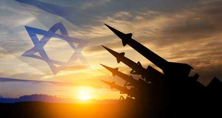 The missiles are aimed at the sky at sunset with Israel flag. Nuclear bomb, chemical weapons,...