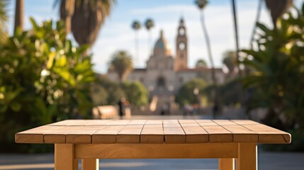 The empty wooden table top with a blurred background of the downtown business district.