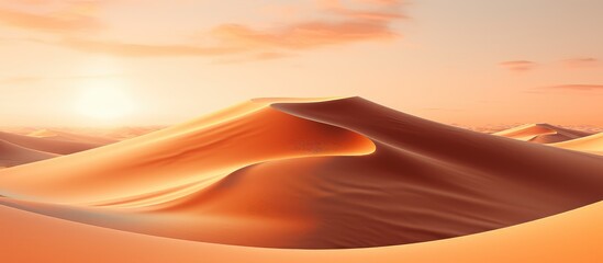 Fototapeta na wymiar Aerial perspective of desert sand dunes during sunset