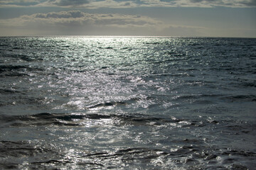 Sea water in rippled water detail background. Ocean waves pattern.
