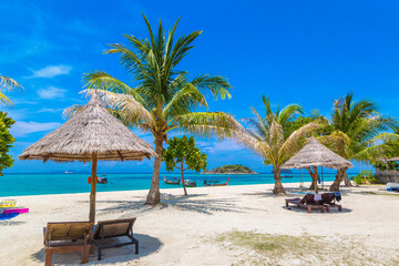 Parasol, sunbed on beach