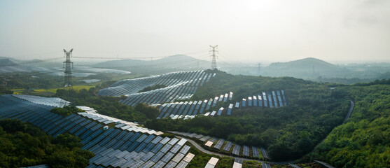 view of solar power panels on hill