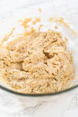 Lemon poppy seed muffins garnished with almond slivers