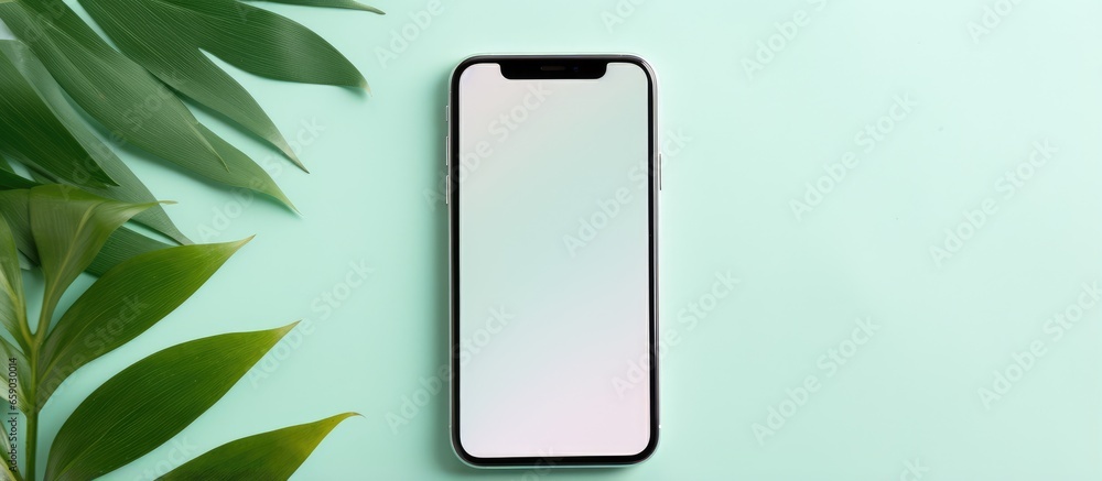 Poster top view of a black phone on green background displaying blank screen in a minimal summer style sett