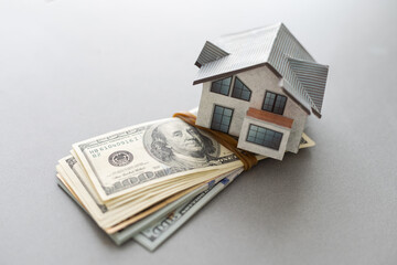 Investment, model house and money