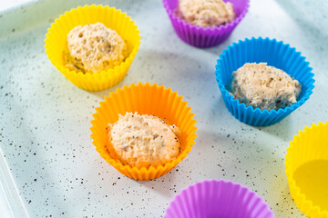 Lemon poppy seed muffins garnished with almond slivers
