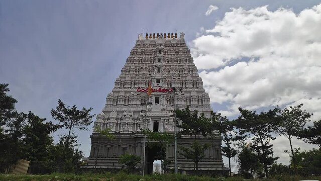 Huge Gopuram or temple entrance tower with detailed artwork and architecture