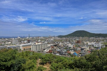 Fototapeta na wymiar 丸亀城から見た宇多津市街地と青ノ山