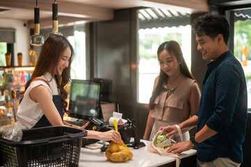 An Asian couple shopping in supermarket , concept of city life lifestyle