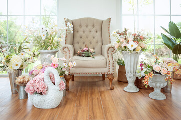 Interior of armchair decorated with Beautiful flowers for wedding ceremony.
