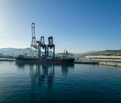 Tanger Med, Morocco - July 28: Container vessel in port of Tanger Med on July 28, 2023 in Tanger Med, Morocco.