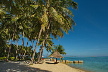 Malaysia. The coast of one of the many reef islands along the east coast of Borneo.