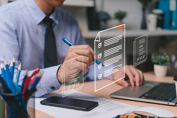 Businessman electronically signs documents using a pen on a virtual screen, concept of e-signatures...