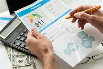 Credit report with score on a desk