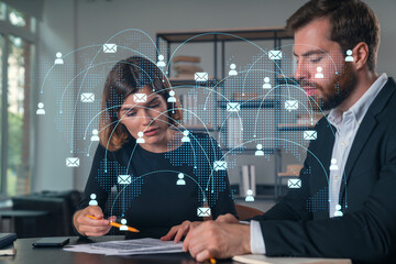 Businesspeople in formal wear taking notes signing contract at office workplace. Concept of important working moments, document sign, working process, concentration. Network hologram