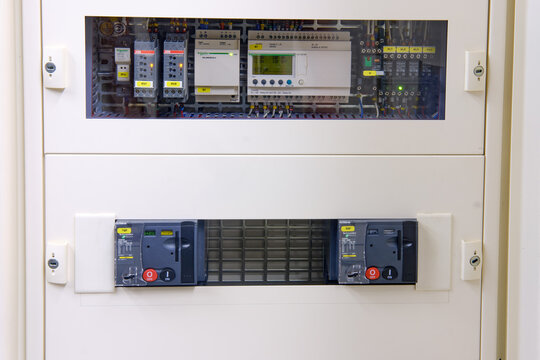 A modern control panel Abb и Schneider with an automatic breaker for electrical safety. The electrician installed a new distribution system with an automatic switch - Moscow, Russia, April 02, 2022