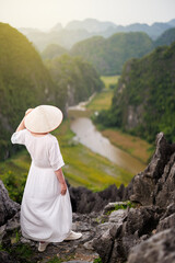 Beautiful woman enjoying stunning view in Vietnam