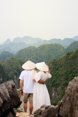 Fototapeta na wymiar Couple enjoying stunning view in Vietnam