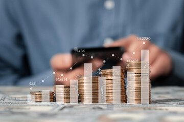 Business growth concept, businessman analyzes financial growth graph and economic trends with money coins. Financial profit return and dividend. - obrazy, fototapety, plakaty