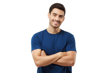 Portrait of smiling handsome man in blue t-shirt standing with arms crossed