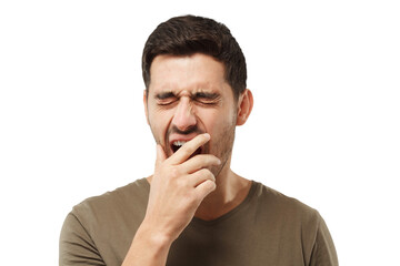 Fototapeta premium Sleepy young man yawning, waking up, closing his mouth with hand