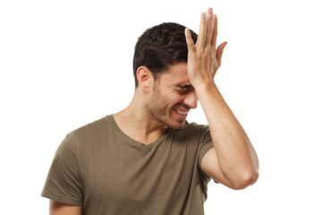 Stressed out man doing facepalm gesture with hand