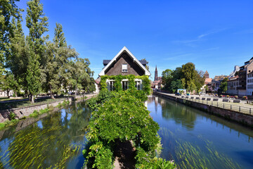 Obraz premium Strasbourg, France, 'Maison des Ponts Couverts' building in River 'III' in historical 'Petite France' quarter