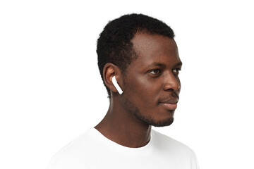 Close-up shot of young smiling african american man wearing blank white t-shirt and earphones,...