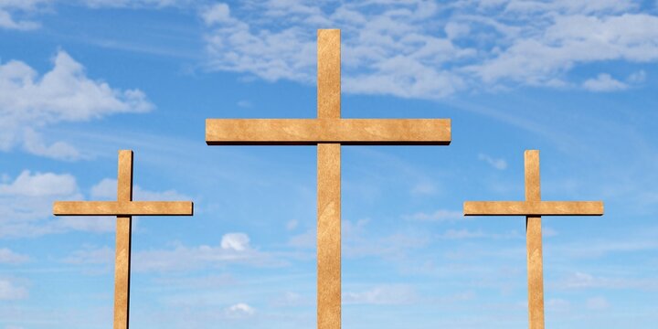 Three Jesus Christ christian crucifixes or crosses in front of blue sky with clouds, god, resurrection or christianity concept