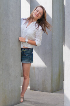 woman standing near the wall