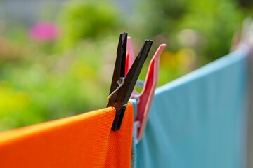 hanging laundry in the garden on a string              